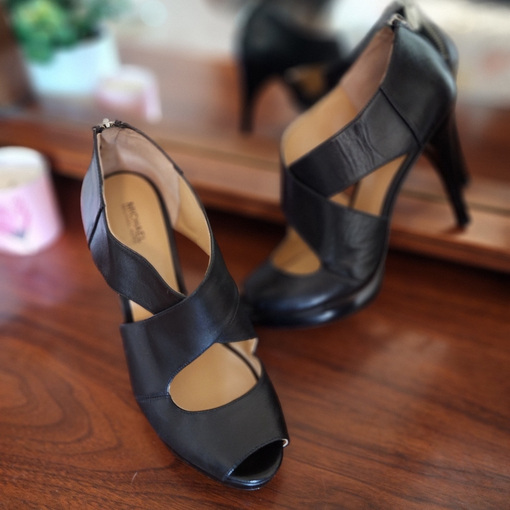 Michael Kors platform stiletto heels with back zipper.  Never worn. Size 10